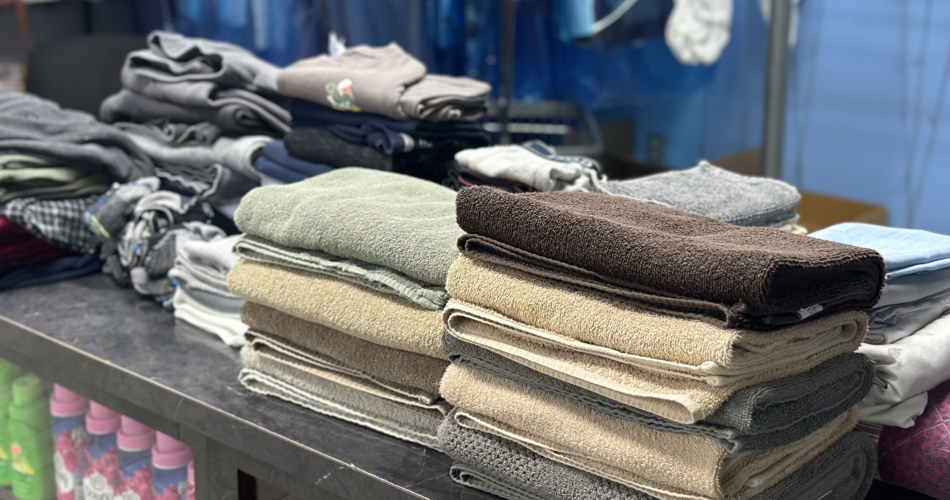 folded towels at Yours Cleanly Laundry